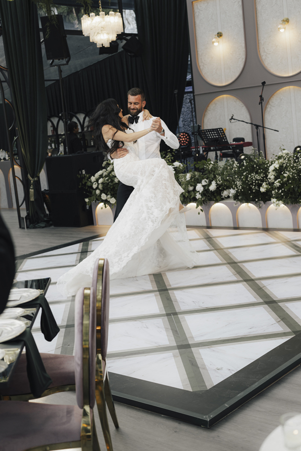 The couple dance together before dinner at Villa Pizzo.