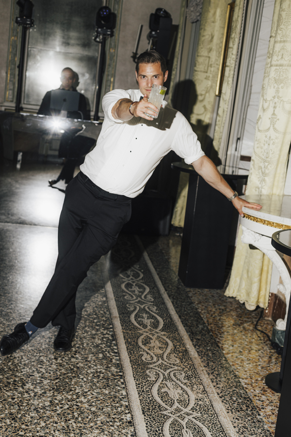 A guest dances inside Villa Pizzo during the late-night party.