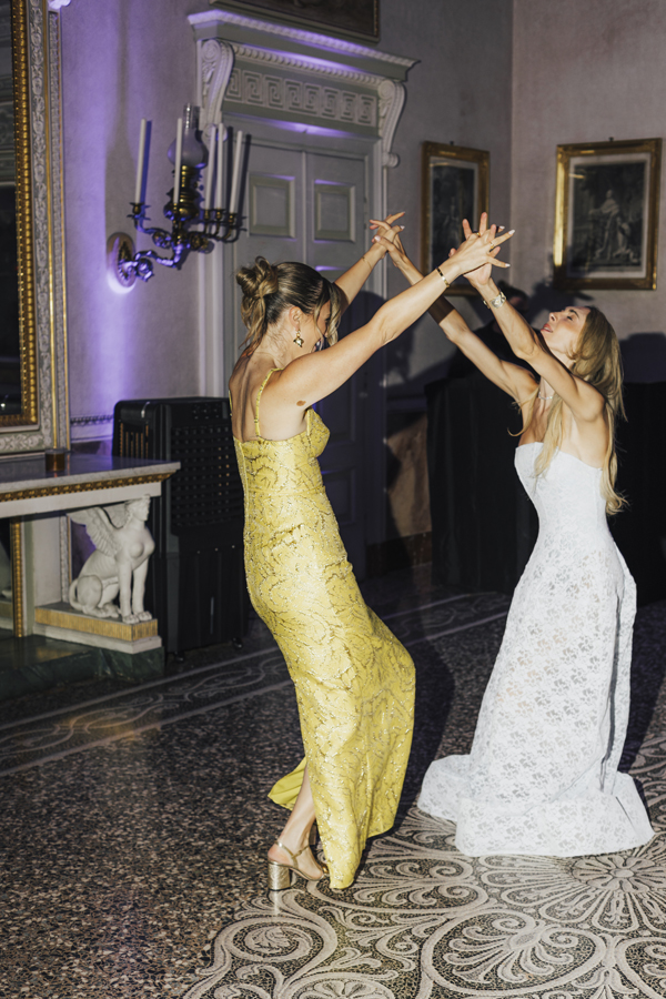 Guests dance together inside Villa Pizzo during the evening party.