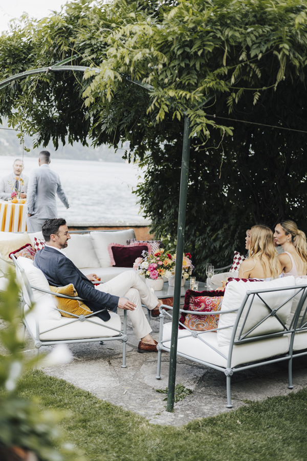 Wedding guests enjoying a relaxed lakeside celebration