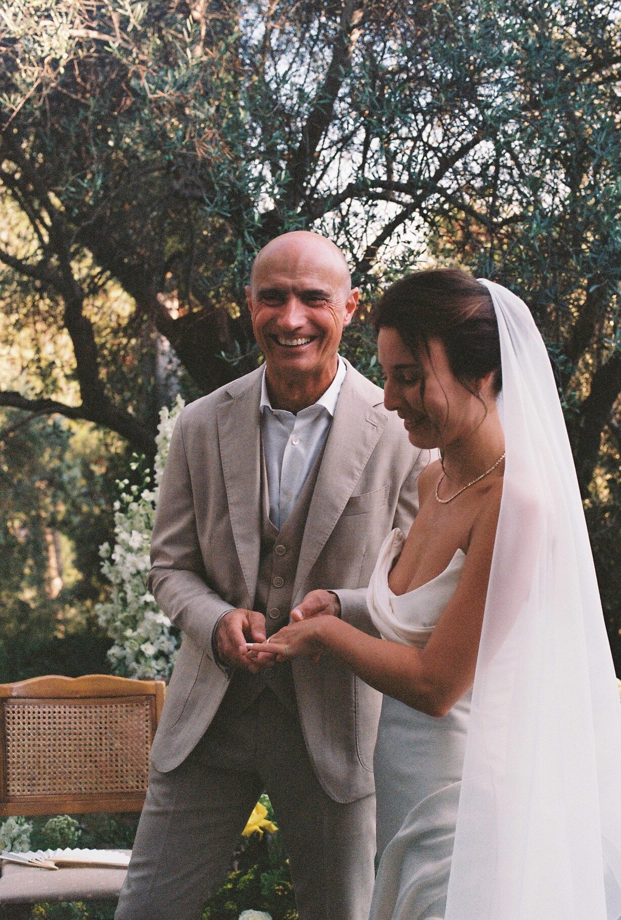 A candid newlywed moment photographed on 35mm film
