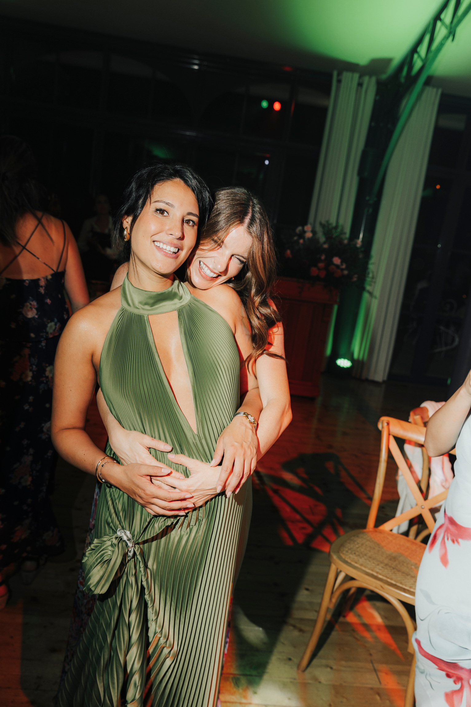 Wedding guests sharing a spontaneous late-night moment at Château Belle Époque in France.