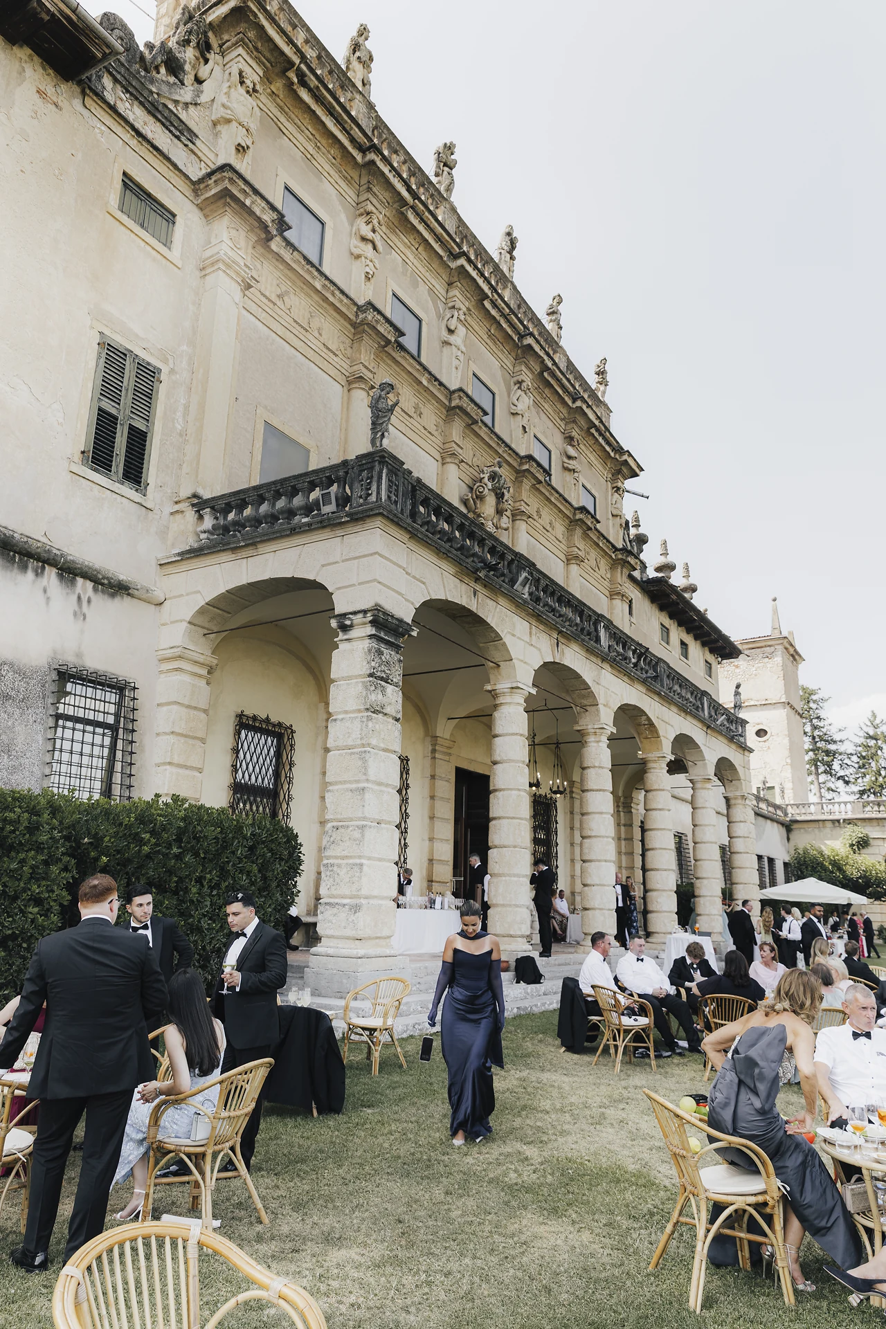 Aperitivo unfolding along the villa's colonnade