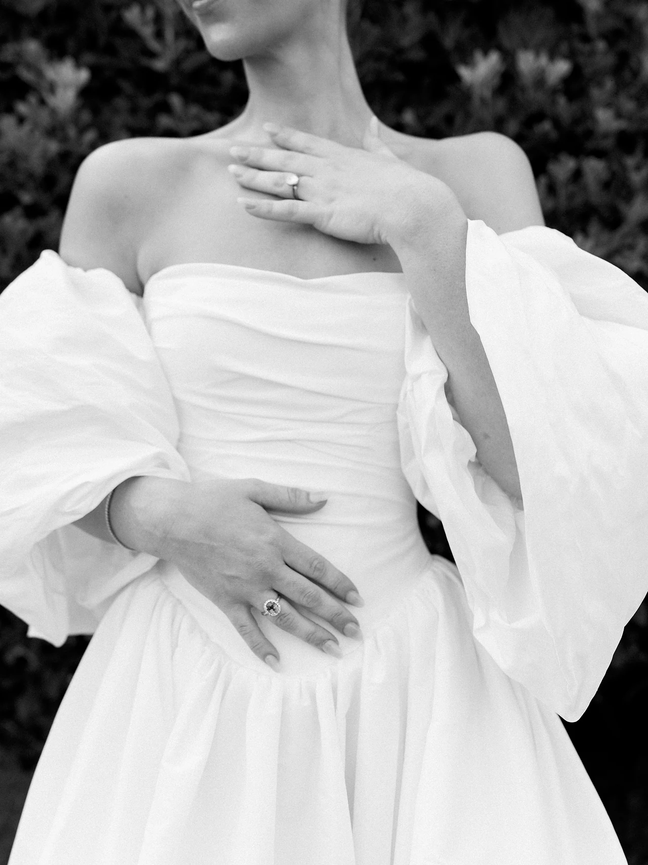 A close black and white study of the gown and its structure