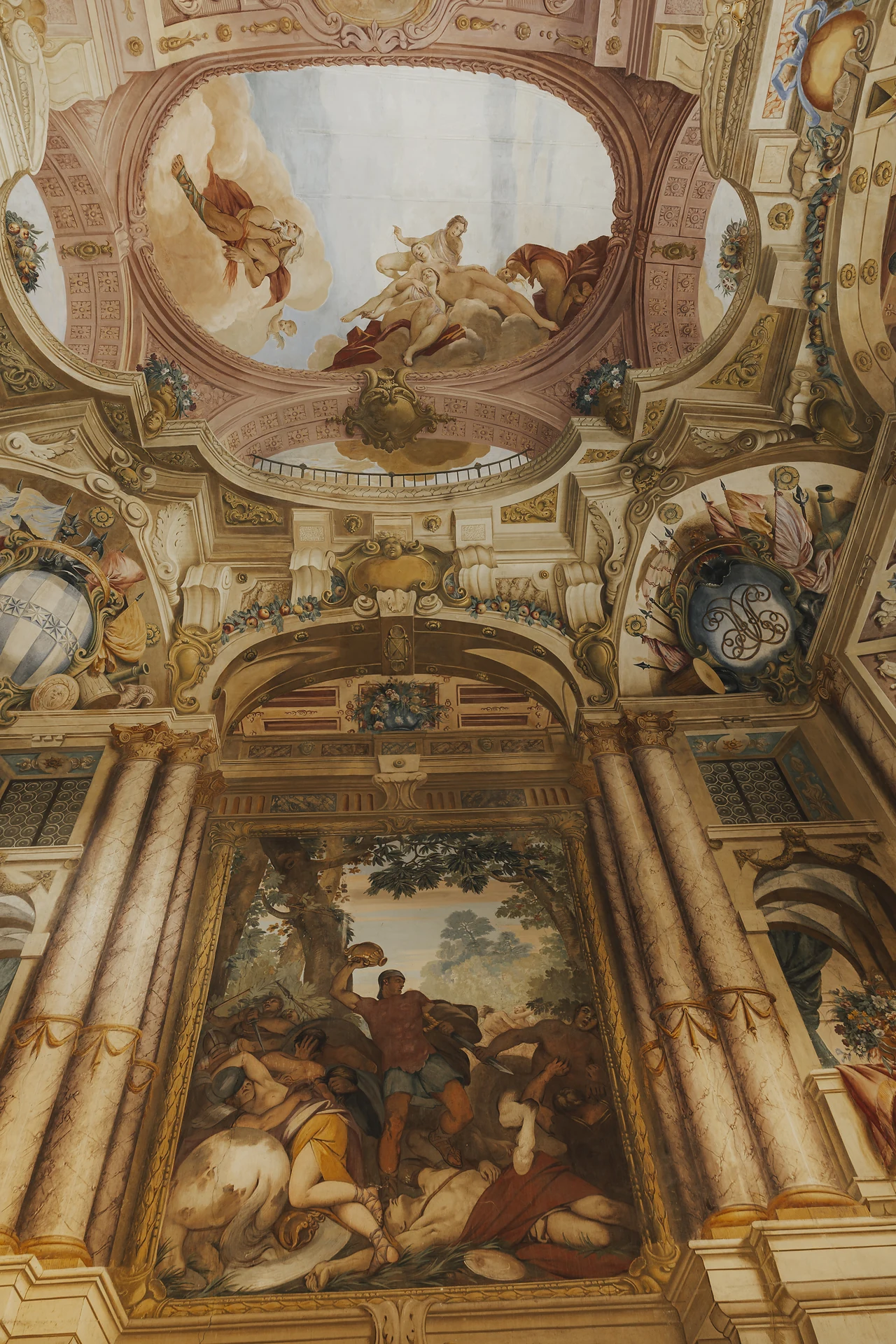 The painted ceiling above the celebration