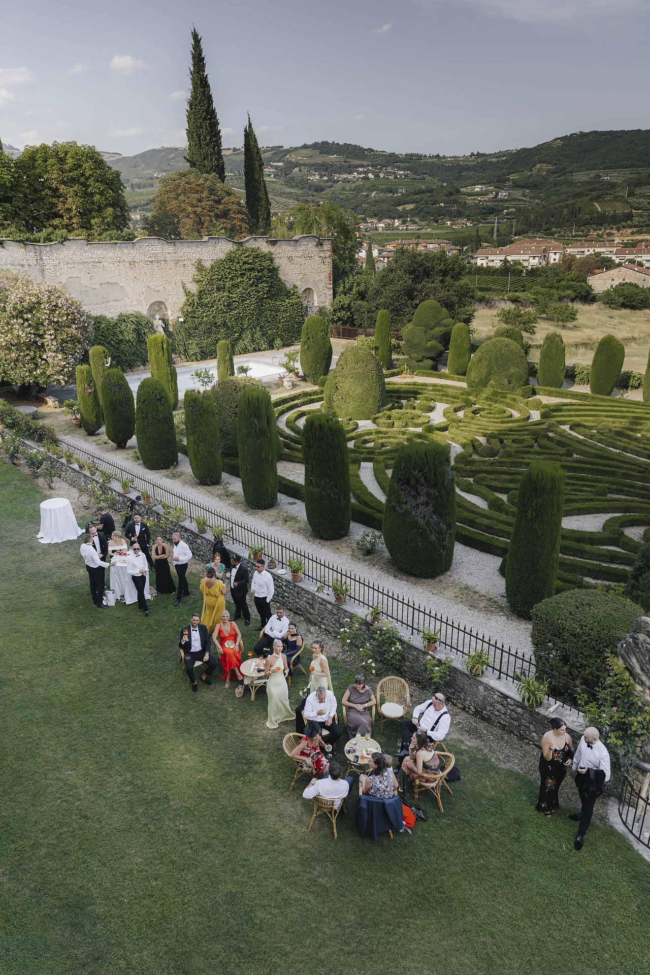 Guests seen from above in Villa Arvedi's formal garden