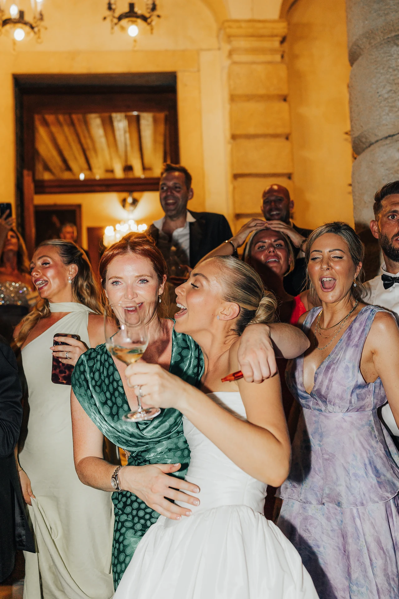 Guests celebrating together after dark