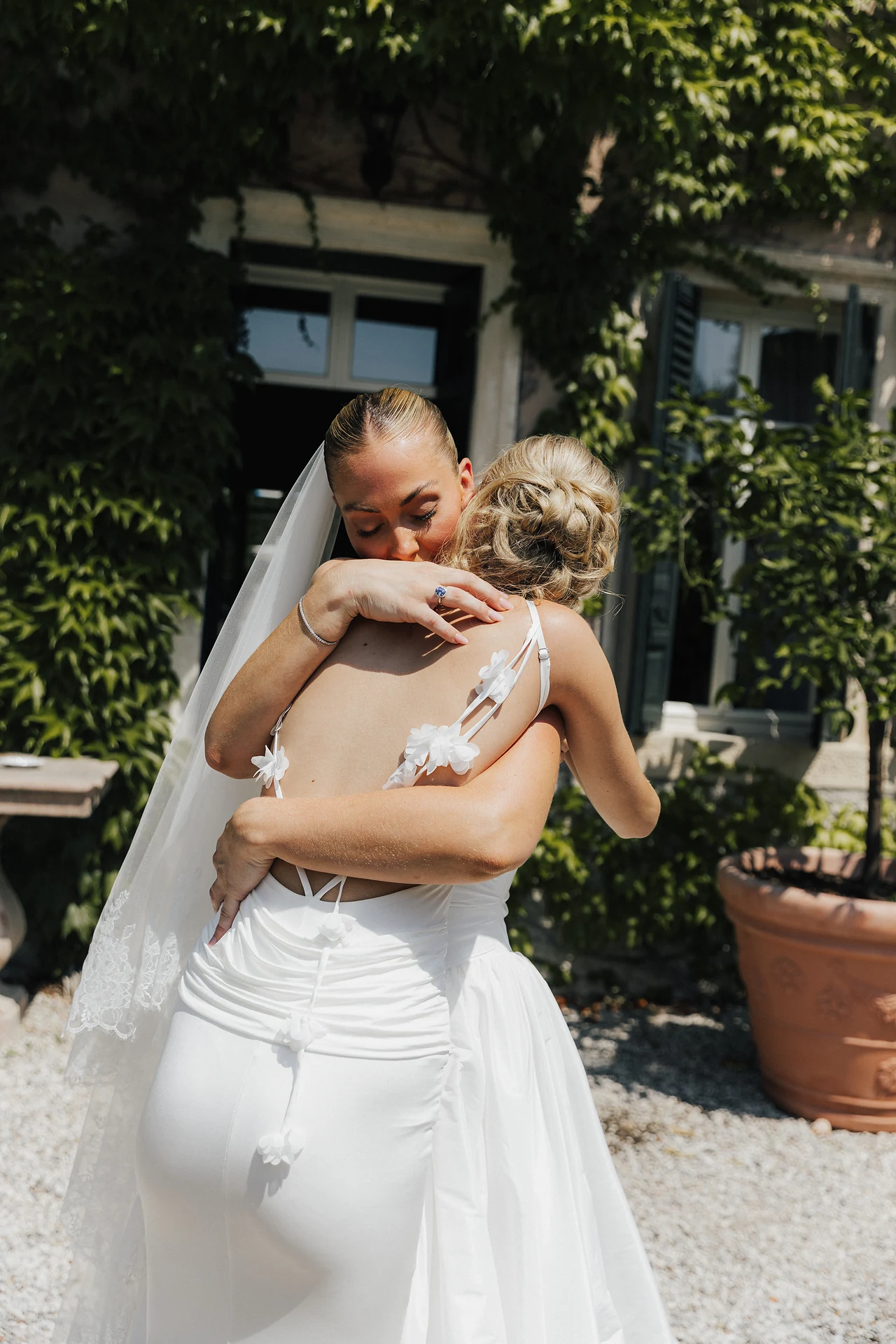 An embrace during the final moments of getting ready