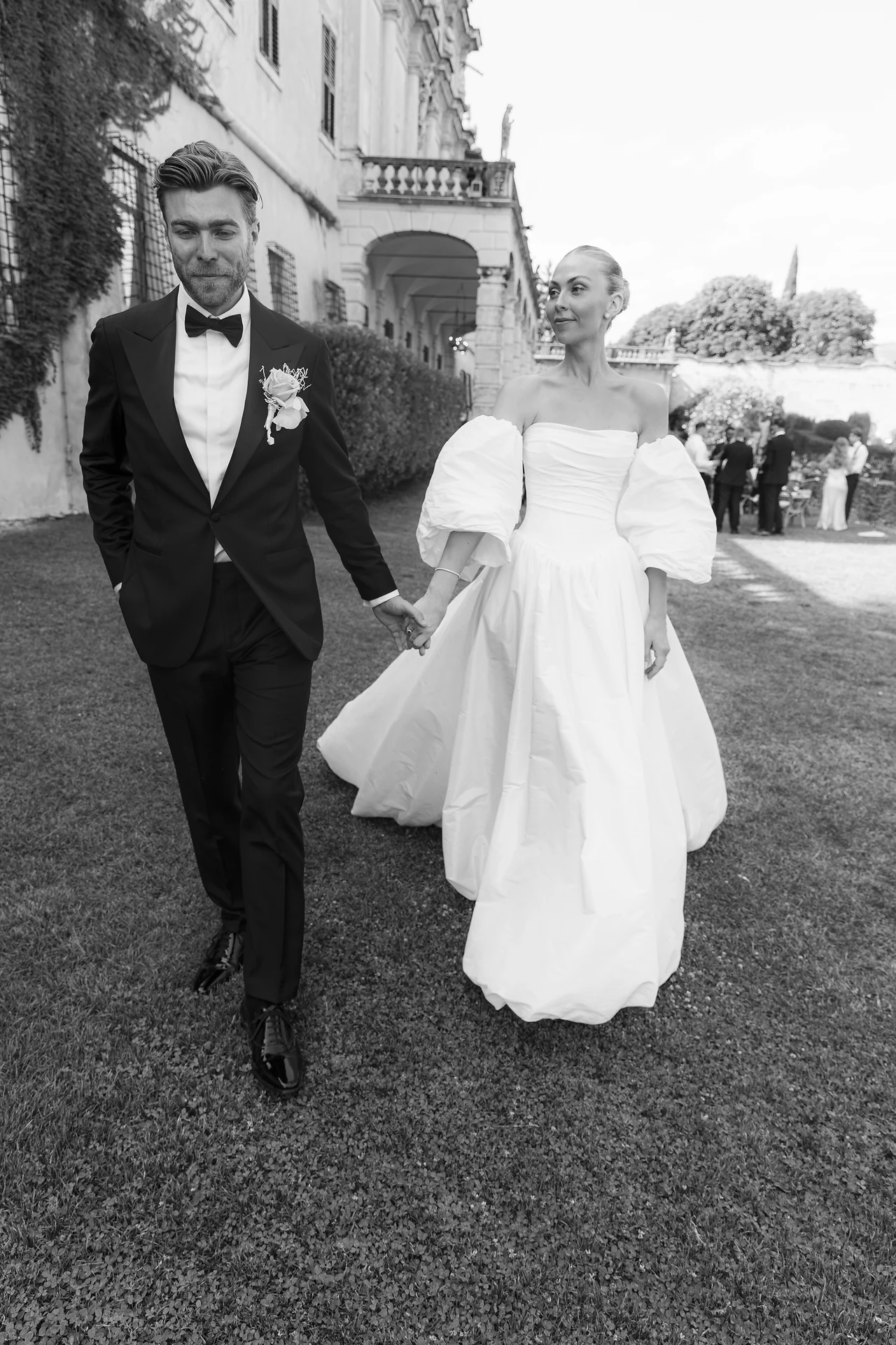 The newlyweds walking together after the ceremony