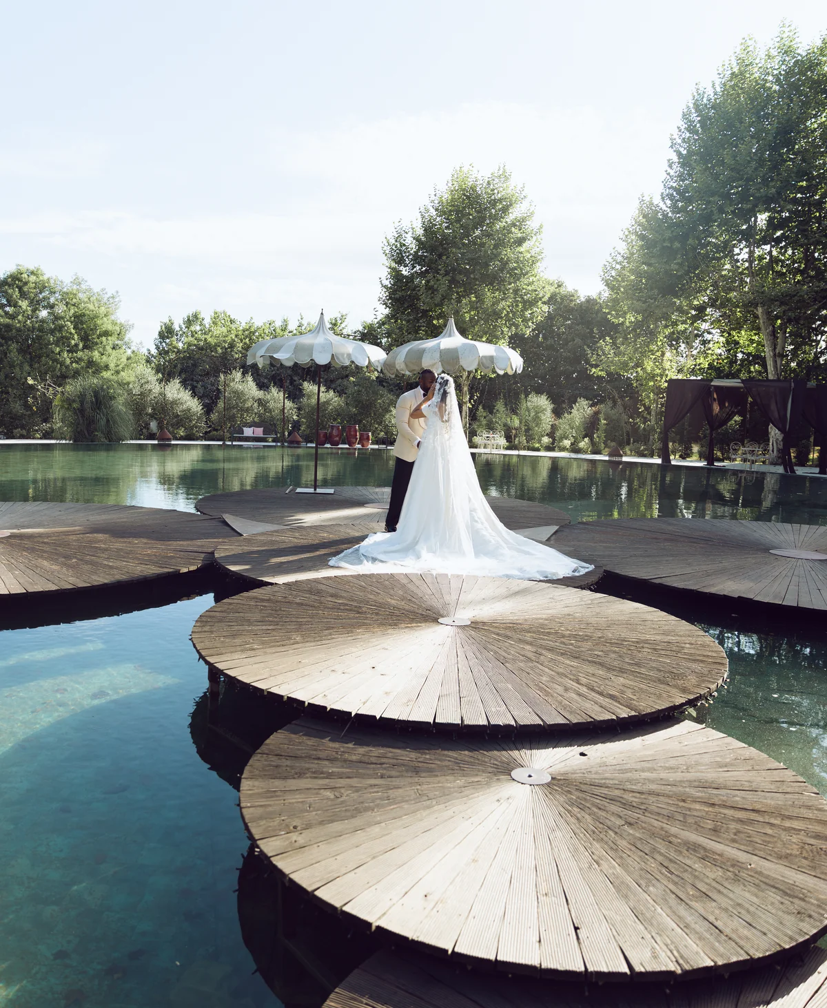 Bride overlooking the water and gardens at Solar da Levada