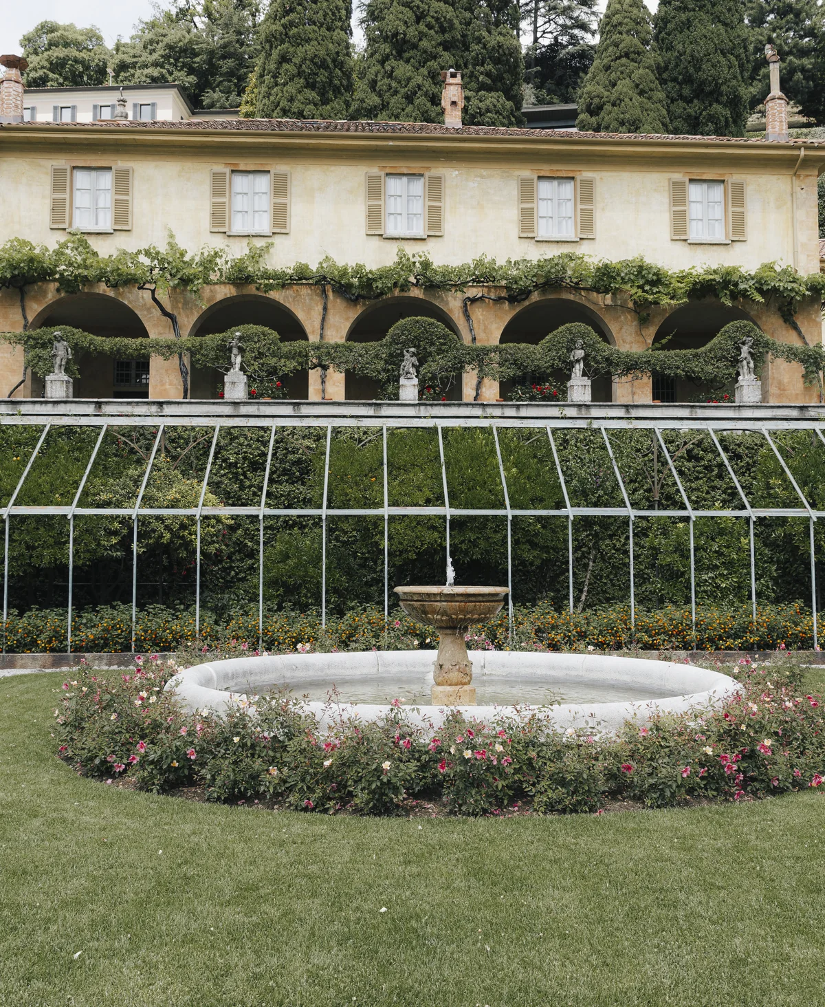 Villa Pizzo facade and formal garden beside Lake Como