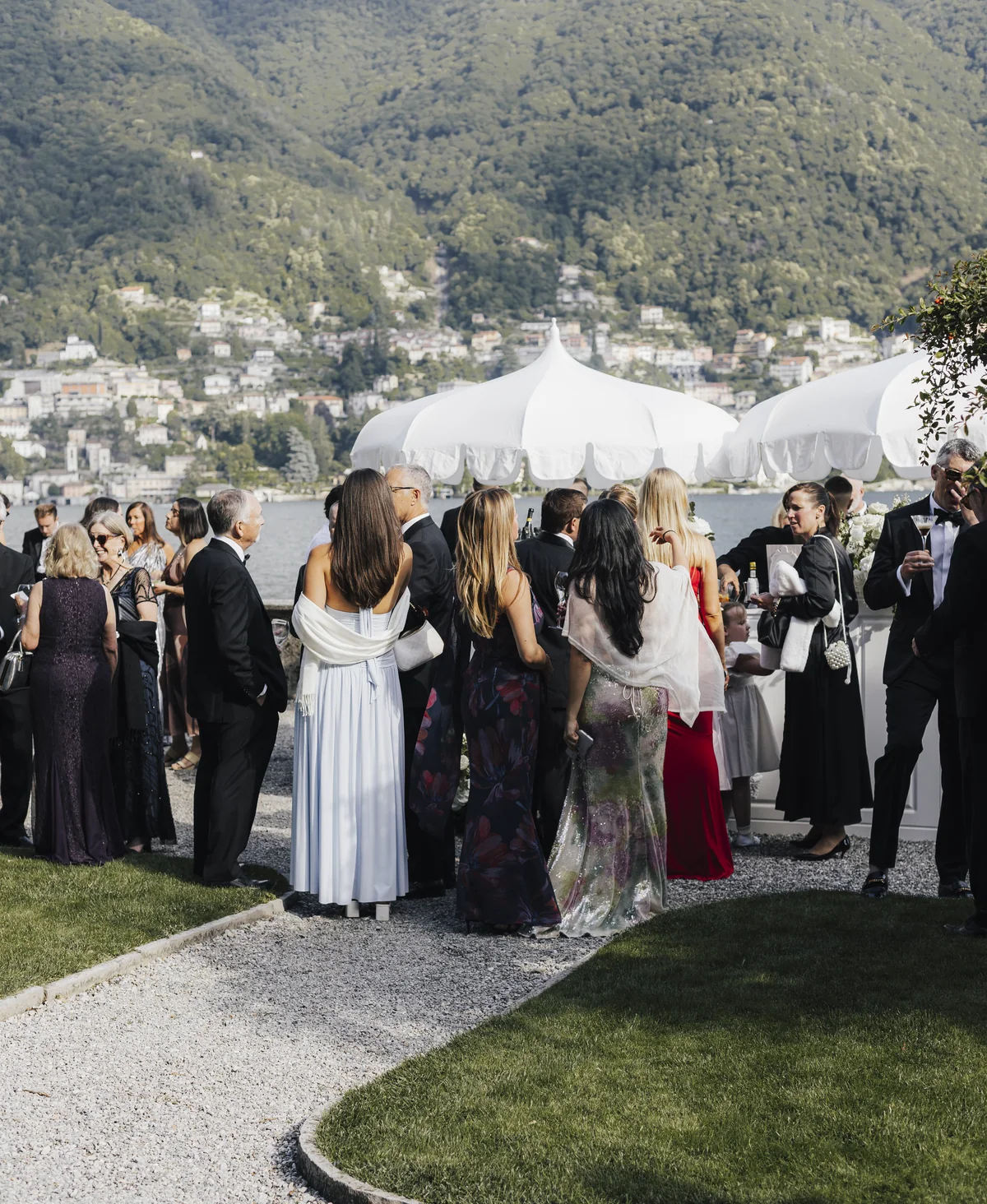 Wedding guests gathering beside Lake Como at Villa Pizzo