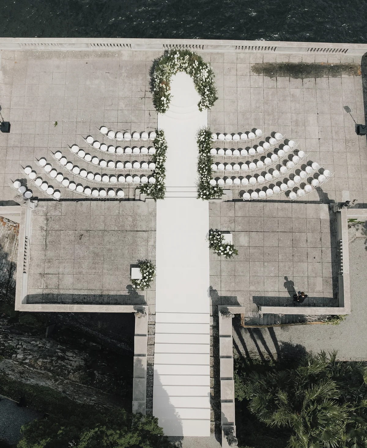 Lakeside wedding terrace at Villa Pizzo prepared for the ceremony